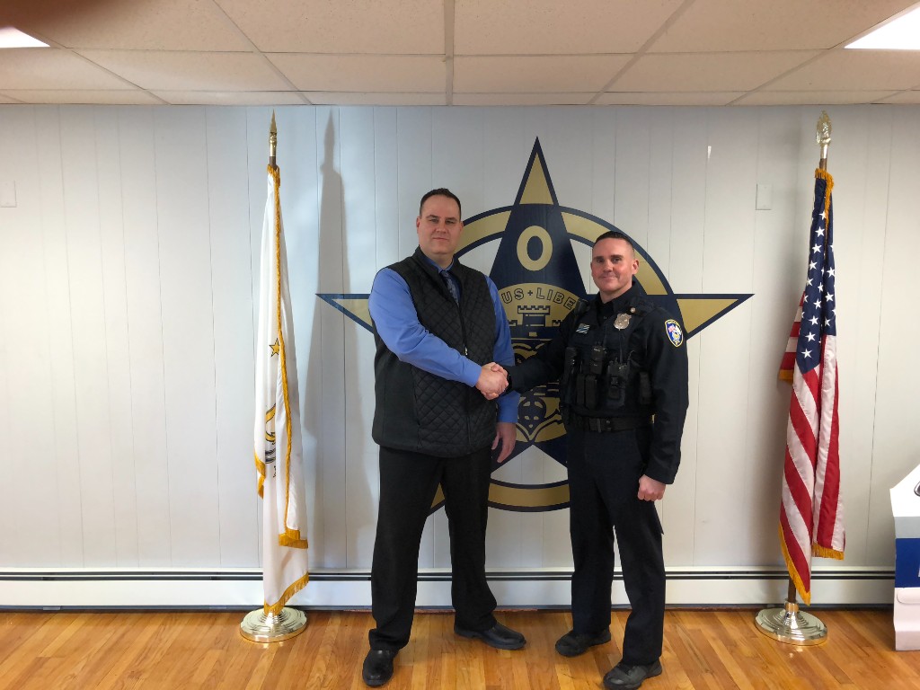 DTS meeting a uniformed officer in a public-safety office